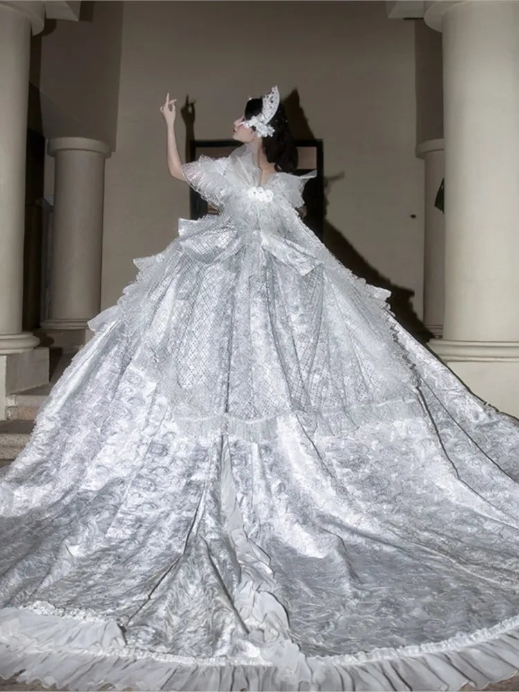 A luxurious wedding dress with lace beaded water heavy craftsmanship and elegant one-shoulder design