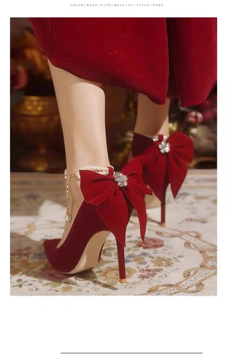 Red Xiuhe wedding shoes new pointy stiletto high heels female shallow mouth bow pearl one word buckle strap two wear bride shoes