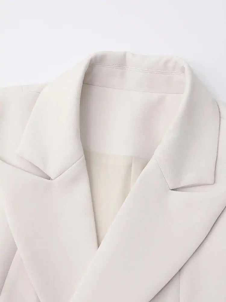 [EAM] Women Beige Irregular Hem Buckle Long Elegant Blazer New Lapel Long Sleeve Jacket Fashion Tide Spring Autumn 2025 CPDB133
