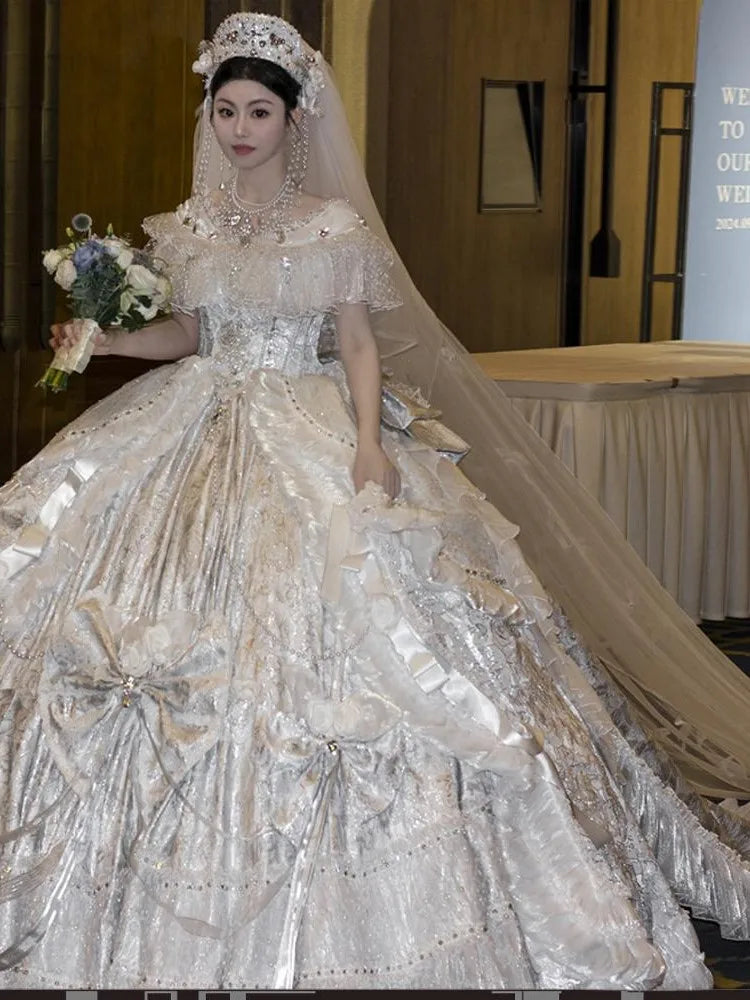 A luxurious wedding dress with lace beaded water heavy craftsmanship and elegant one-shoulder design