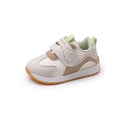 Baby walking shoes with leather surface for autumn and winter, new baby soft soled breathable sports shoes for boys and girls