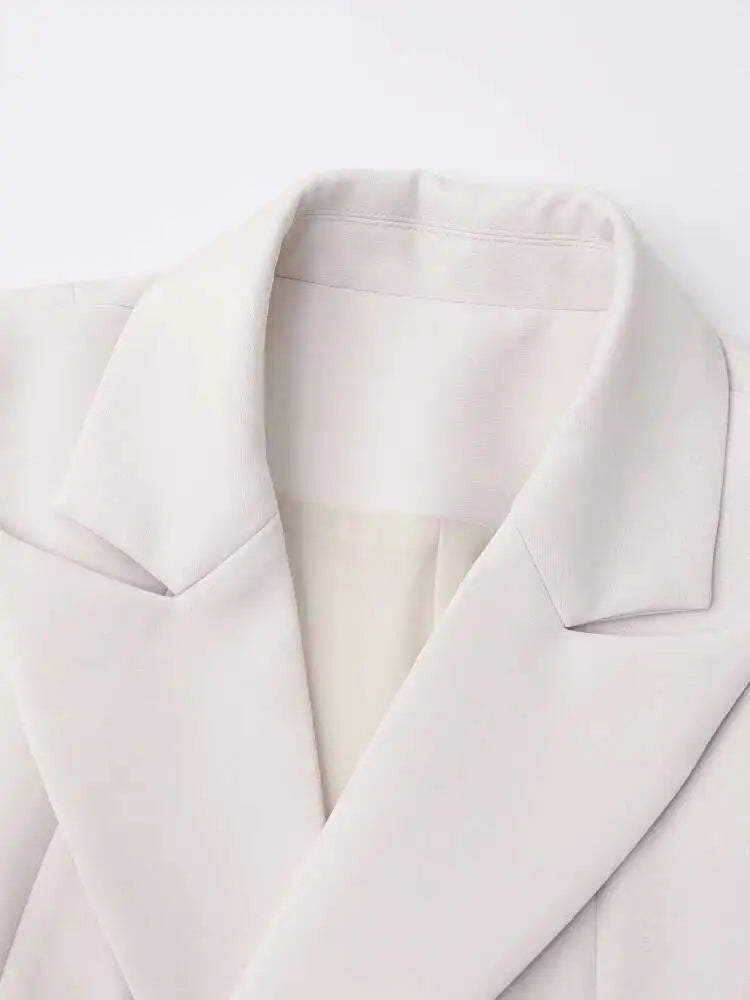 [EAM] Women Beige Irregular Hem Buckle Long Elegant Blazer New Lapel Long Sleeve Jacket Fashion Tide Spring Autumn 2025 CPDB133