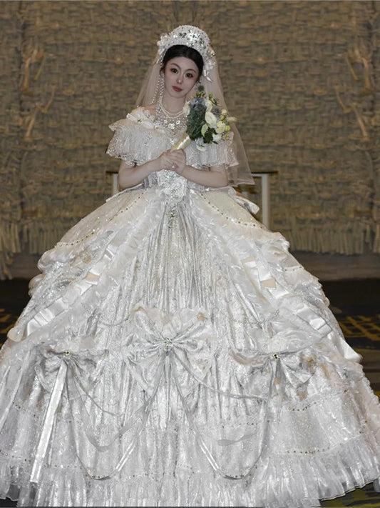 A luxurious wedding dress with lace beaded water heavy craftsmanship and elegant one-shoulder design