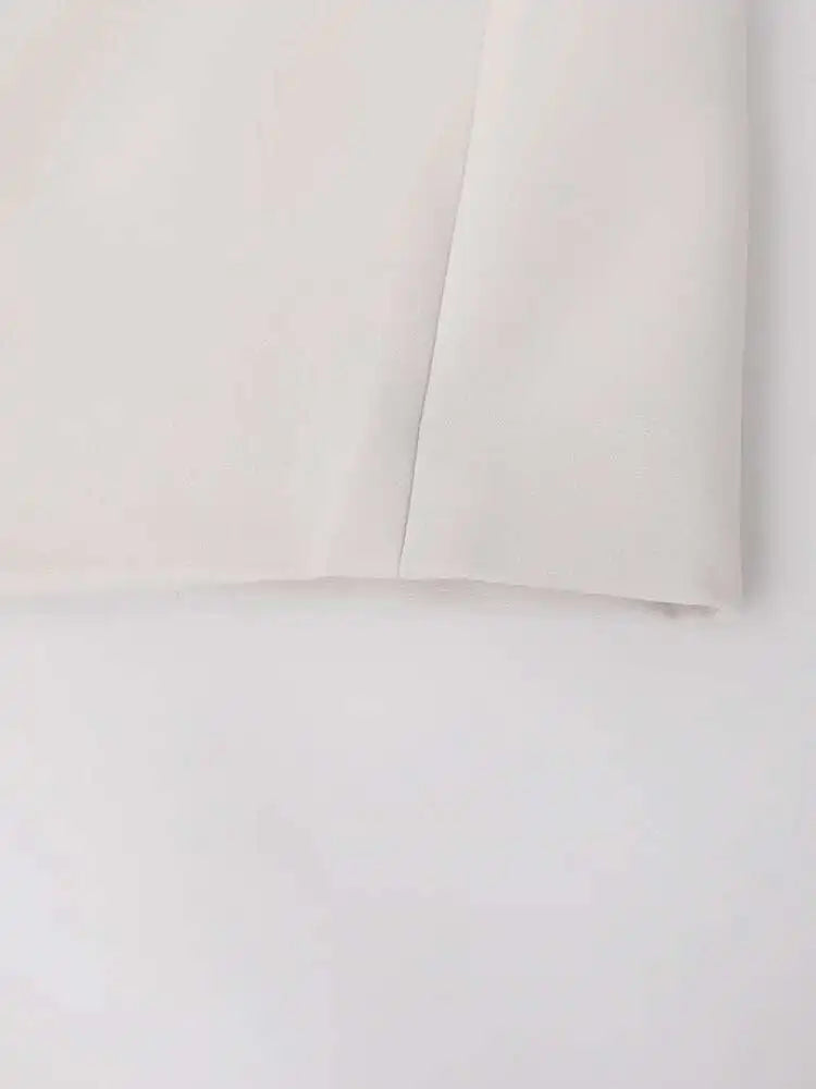 [EAM] Women Beige Irregular Hem Buckle Long Elegant Blazer New Lapel Long Sleeve Jacket Fashion Tide Spring Autumn 2025 CPDB133